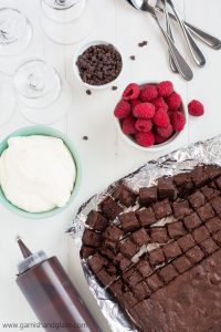 Nothing says "love" like these Raspberry Cheesecake Trifles made with rich chocolate from-scratch chocolate chip brownies, easy no-bake cheesecake filling, and fresh sweet raspberries.