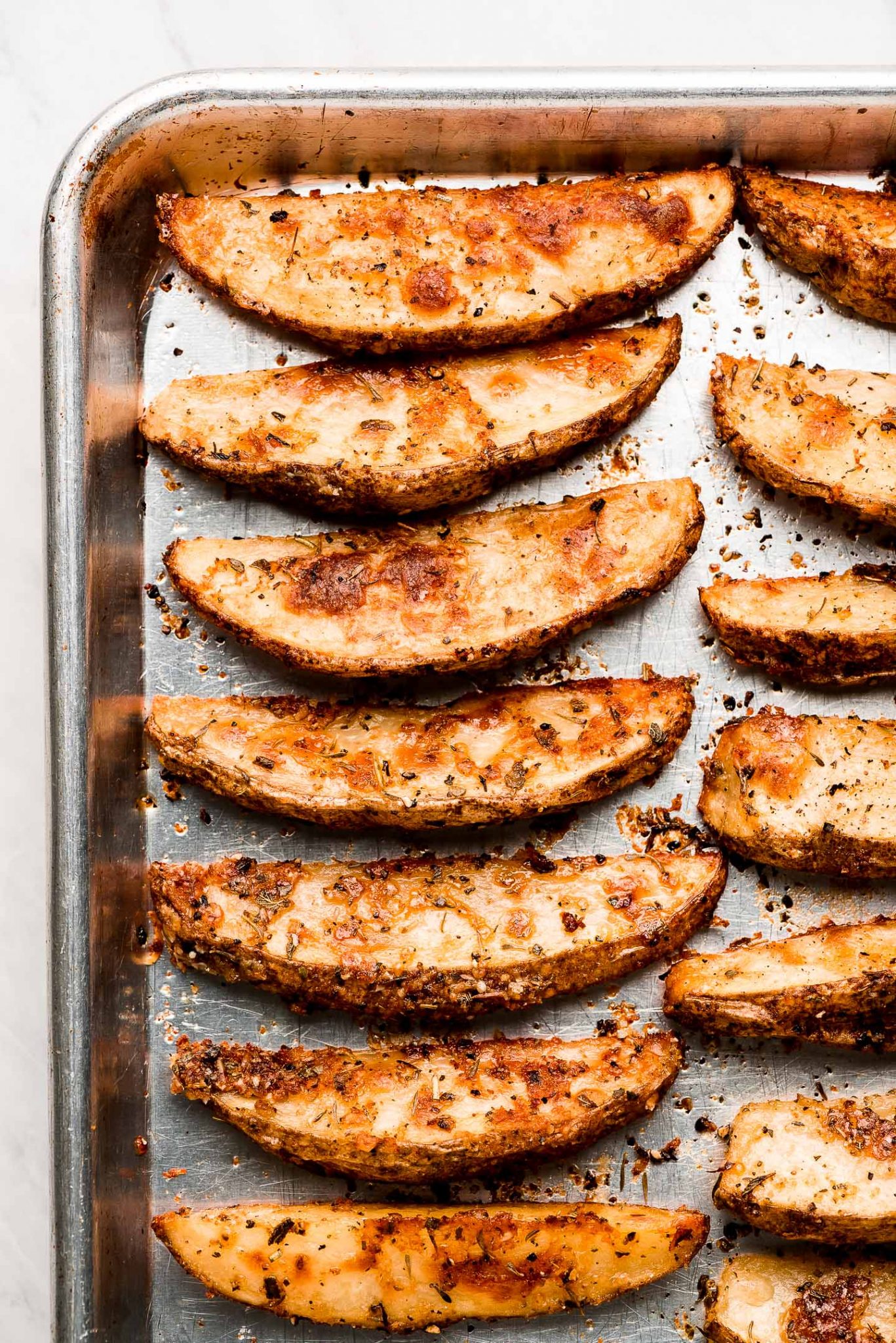 The BEST Crispy Baked Potato Wedges - Garnish & Glaze