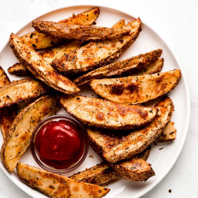 The BEST Crispy Baked Potato Wedges - Garnish & Glaze