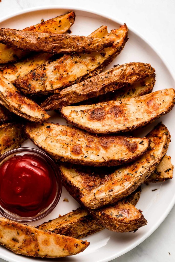 The BEST Crispy Baked Potato Wedges - Garnish & Glaze